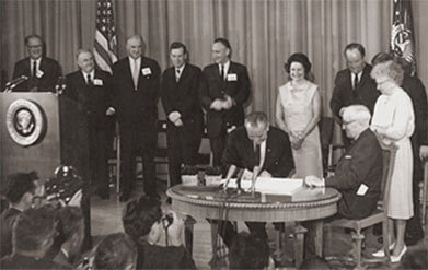 Harry S. Truman signing the Medicare bill